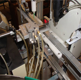 Automatic locking screw machine